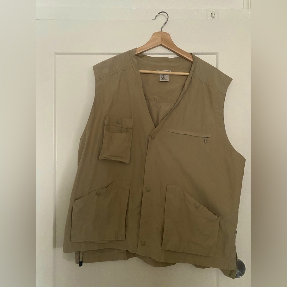 REI multifunctional vest with pockets, adjustable, vent, fishing hunting hiking